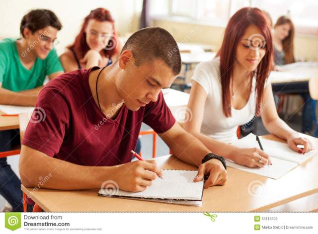 portrait-high-school-student-desk-class-students-writing-their-notebook-53118805